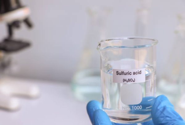 sulfuric acid in glass, chemical in the laboratory and industry, corrosive chemical